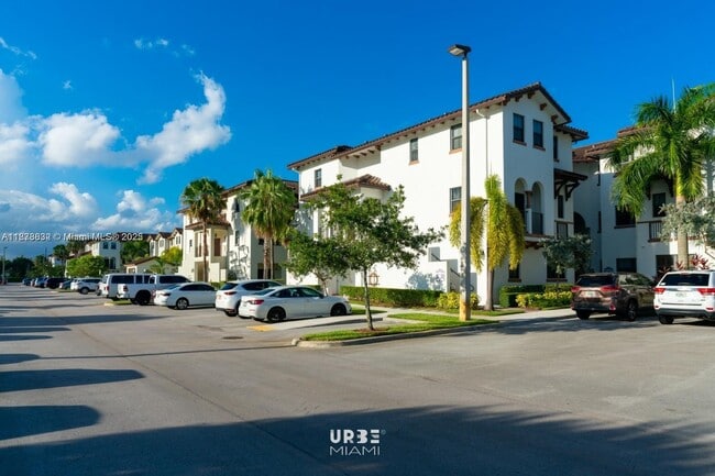 Building Photo - 10630 NW 88th St Unit 210
