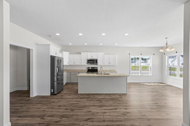 Photo - Like-New 4BR Home in Stateside with Pool Access & Side-Load Garage