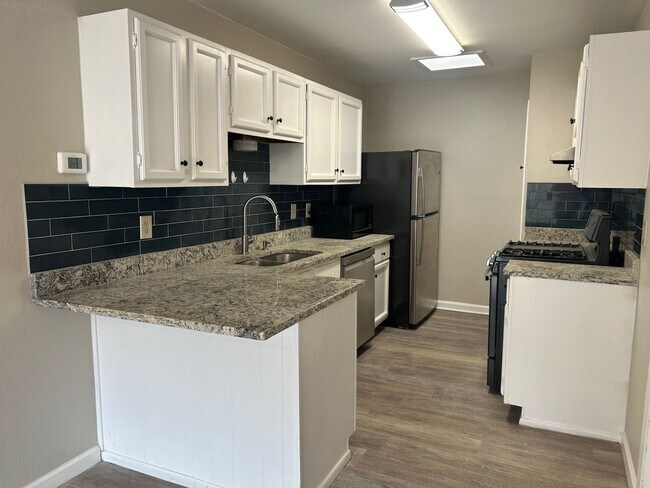 Photo - Remodeled 3 Bedroom 2 Bath  with cute back...