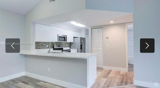 Building Photo - 18840 NW 57th Ave Unit 306 Rental