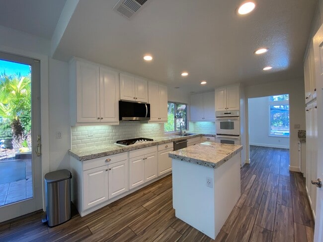 Photo - Stunning 4 bedroom Home with a Pool locate...