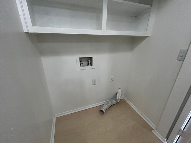 Photo - 1/2 OFF 1ST MONTH RENT! Modern 3-Bed, 2.5-Bath Townhome with Granite Kitchen & New Appliances!