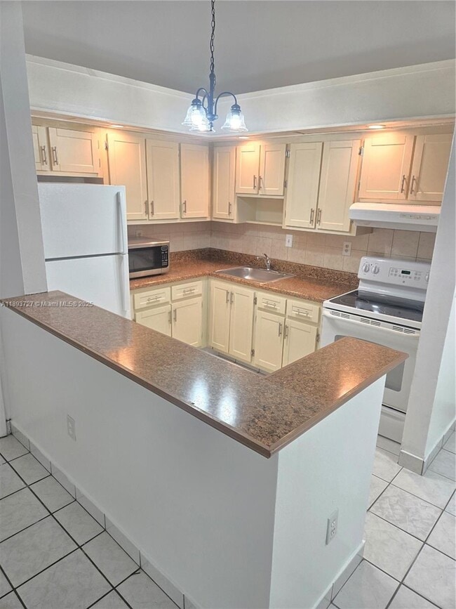 Photo - 18875 NW 62nd Ave Unit 202