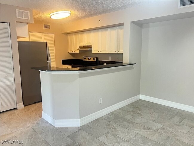 Building Photo - 8245 Ibis Club Dr Unit 410 Rental