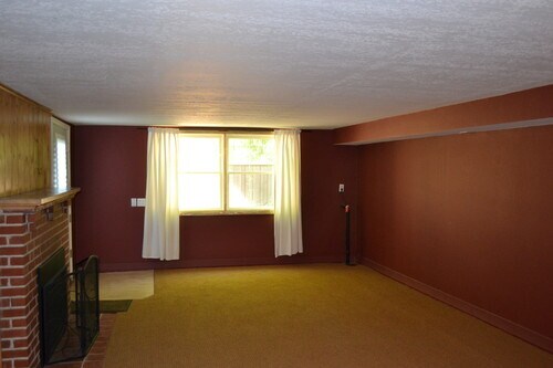 This room downstairs has a full bath can be used as a bedroom/office/bonus room