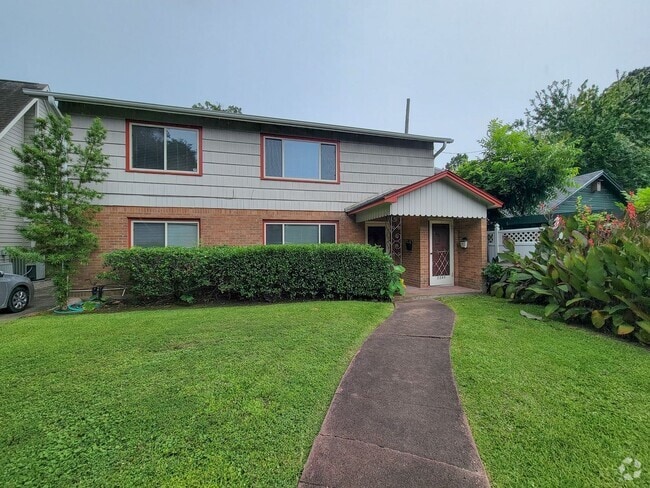 Building Photo - Step into your new home nestled in the vib...