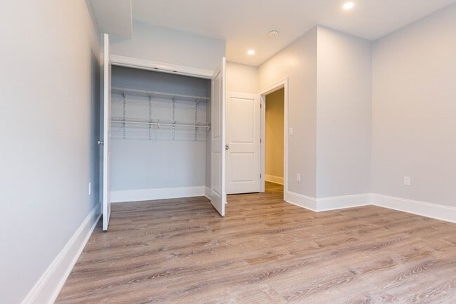Photo - No Broker Fee | Renovated 4 Bed, 2 Bath with In-Unit Laundry & Parking