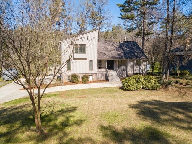 Photo - Spacious 4-Bedroom Mint Hill Retreat with Fireplace, 2-Car Garage & 3,600+ Sq Ft