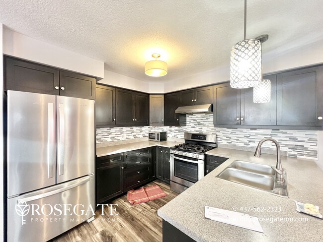Photo - Spacious Main-Level Living with All Utilities Included in Woodstock Unit 1