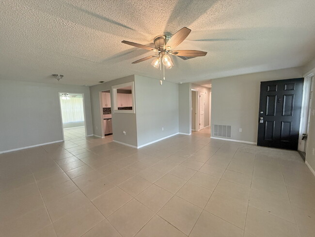 Photo - "Charming 3-Bed Oasis with 2 Full Baths in New Port Richey – Your Perfect Retreat Awaits!"