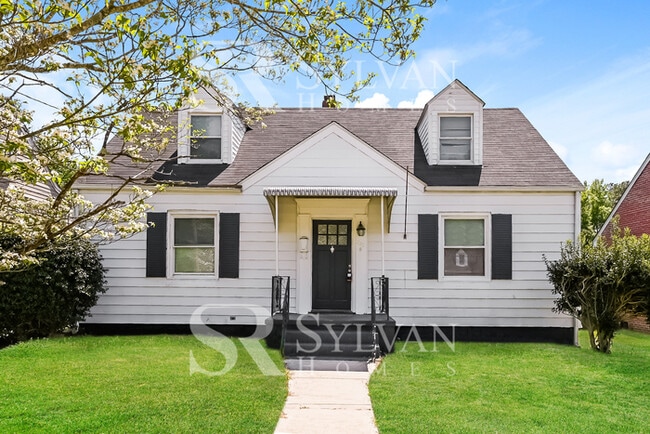 Photo - The living is easy in this 4 bedroom, 1.5 bathroom home