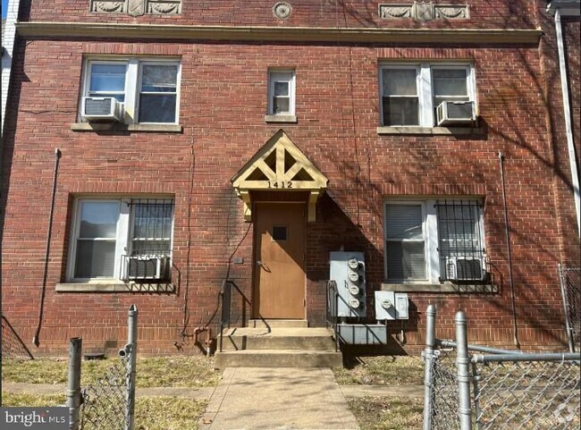 Building Photo - 1412 Staples St NE Unit APT 2