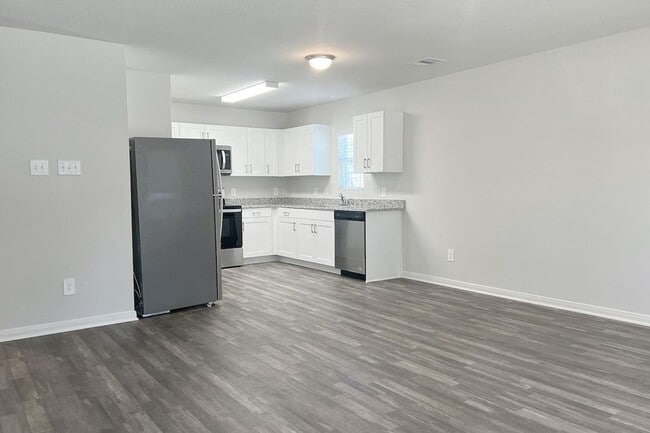 Photo - The home is a 1 story, 2 car garage 3 bedrooms, 2 full baths. Open floor plan from the kitchen ar...