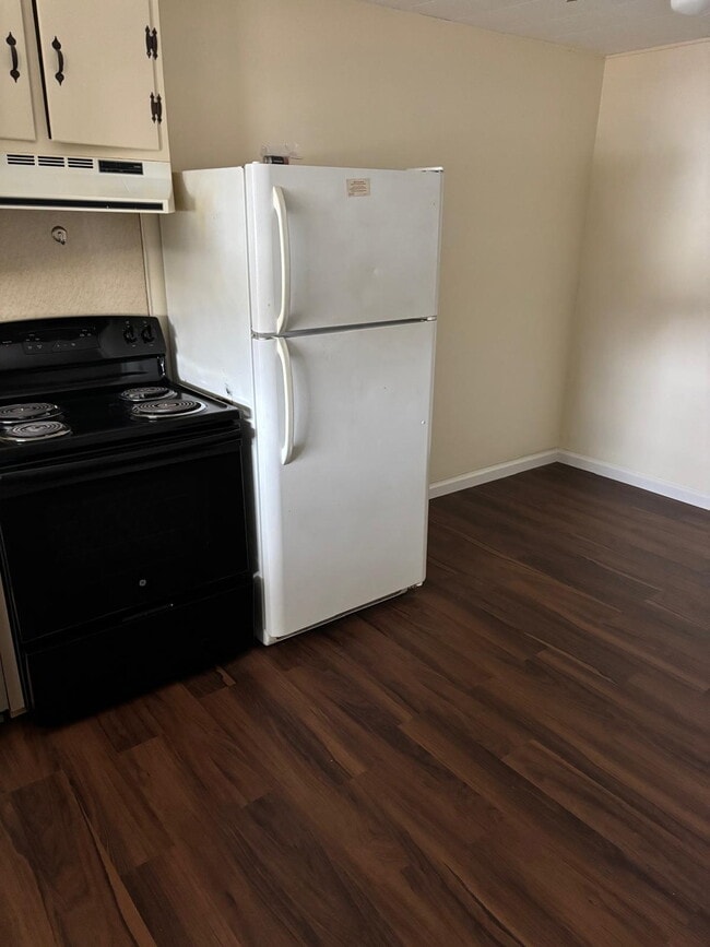 Kitchen with New Floor - 1607 S Olden Ave Unit Apt B