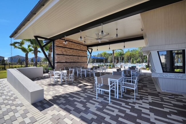 Photo - 2-Bed 2.5 Bath Townhome. Lawncare Included! Screened-in Lanai! Amenities: Dog Park, Playground, P...