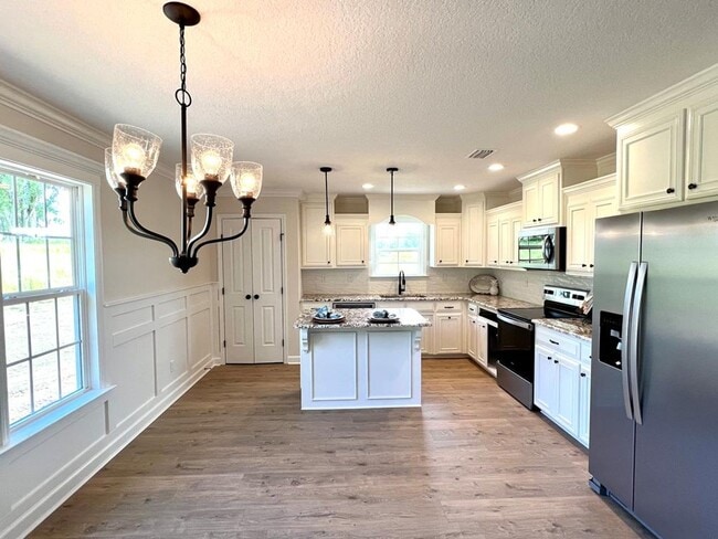 Photo - Elegant & Spacious 4-Bedroom Home in Hahira with Gourmet Kitchen, Private Backyard & Luxurious Ow...