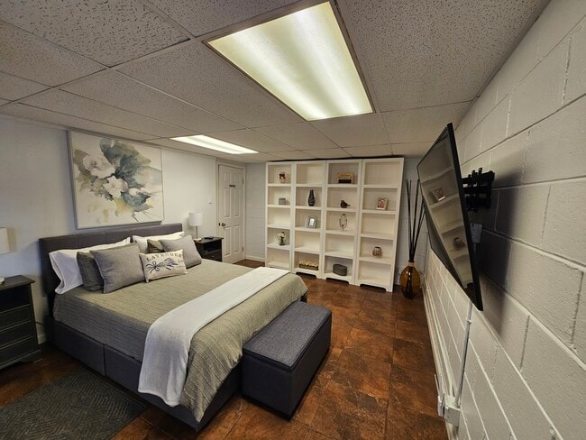 Bedroom with TV & storage - 3150 Clifton Church Rd SE