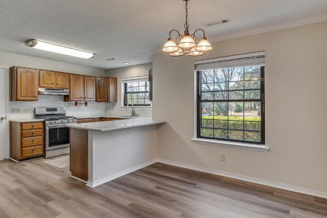 Photo - East Fayetteville 3-Bedroom Home with Granite Touches & Cozy Fireplace!"