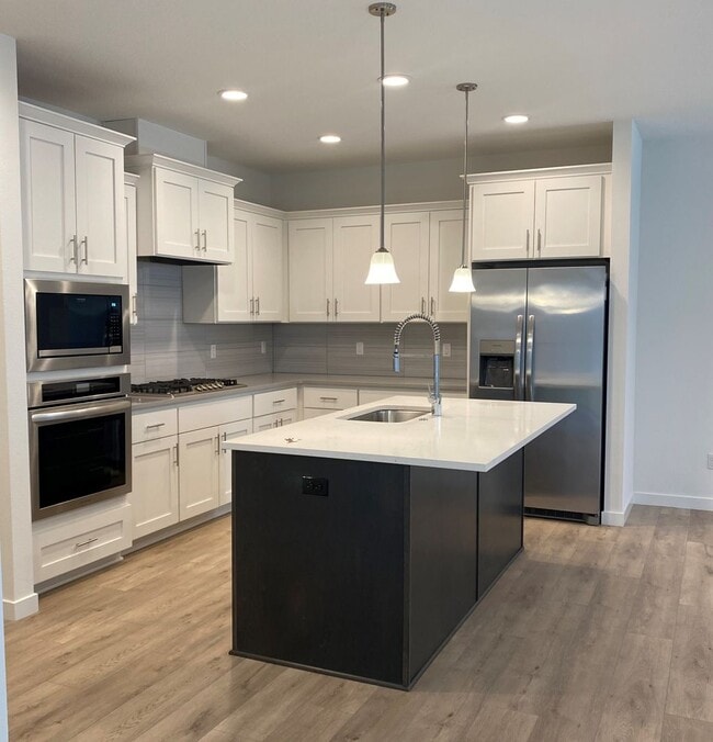 Photo - NEWER CONSTRUCTION! Beautiful Brand Home Backs to Greenspace! Gourmet Kitchen, Open Landing, Fenc...