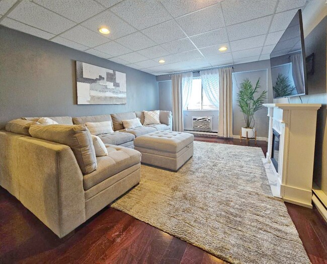 Photo - Large 1 bed 1 bath condo with elevator, washer and dryer in unit. assigned parking, well managed ...