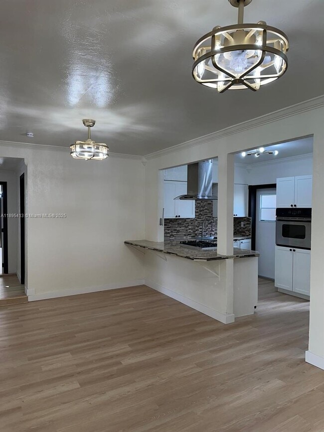 Building Photo - 12287 NE 7th Ave Unit 1