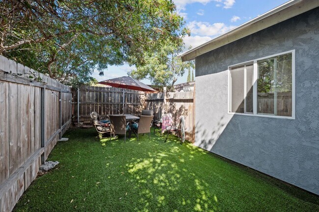 Photo - Private turfed yard!