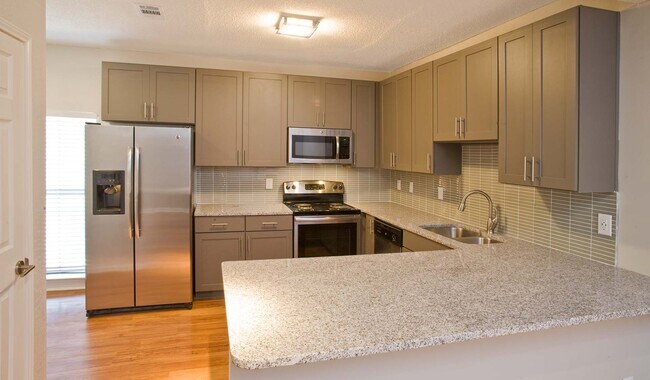 Brand-new kitchens available with stainless steel appliances and granite countertops - Hillmeade