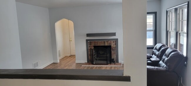 Photo - Two story house with full basement and garage.