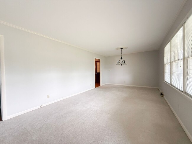 Photo - 3-Bedroom Home with Spacious Yard, Storage Shed & Natural Light
