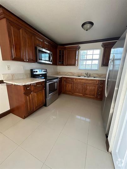 Building Photo - 1255 NW 55th Terrace Unit 1257 Rental