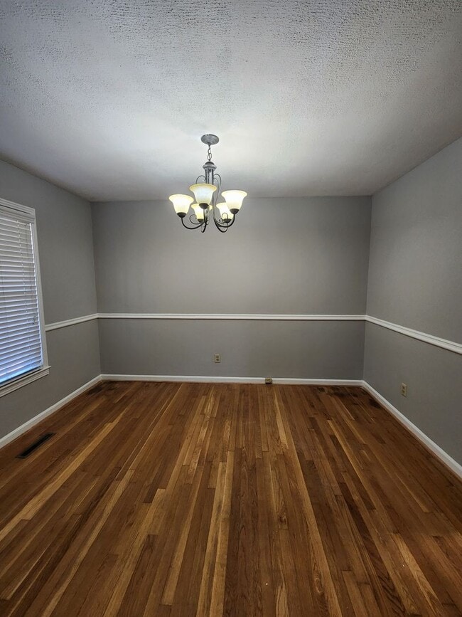 Photo - Spacious 3-Bedroom Brick Home with Two Living Areas & Fenced Backyard!