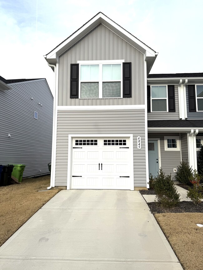 Front of Townhouse - 6845 Tarik Ln Townhome