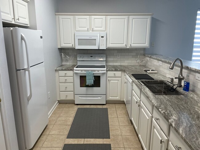 Photo - 3 Bedroom 2 Bath Condo in Sandpiper Bay/Sunset Village Unit GE968 TPP