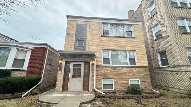 Building Photo - 5715 N Spaulding Ave Unit 1