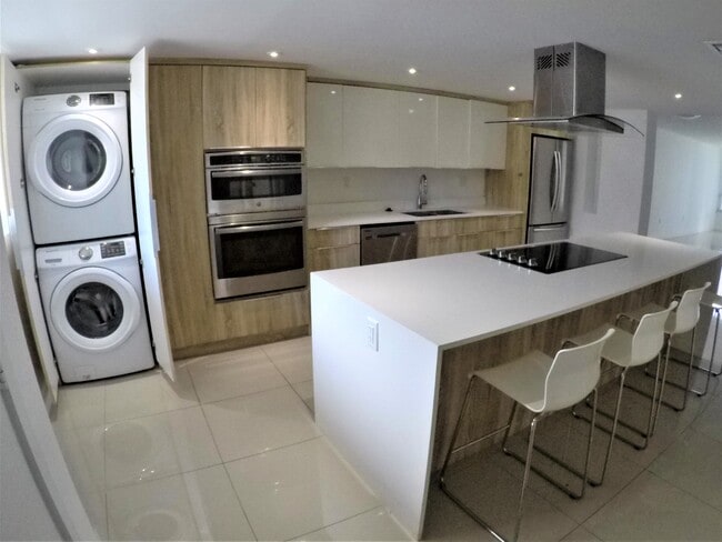 Totally updated - 10230 Collins Ave Unit 208