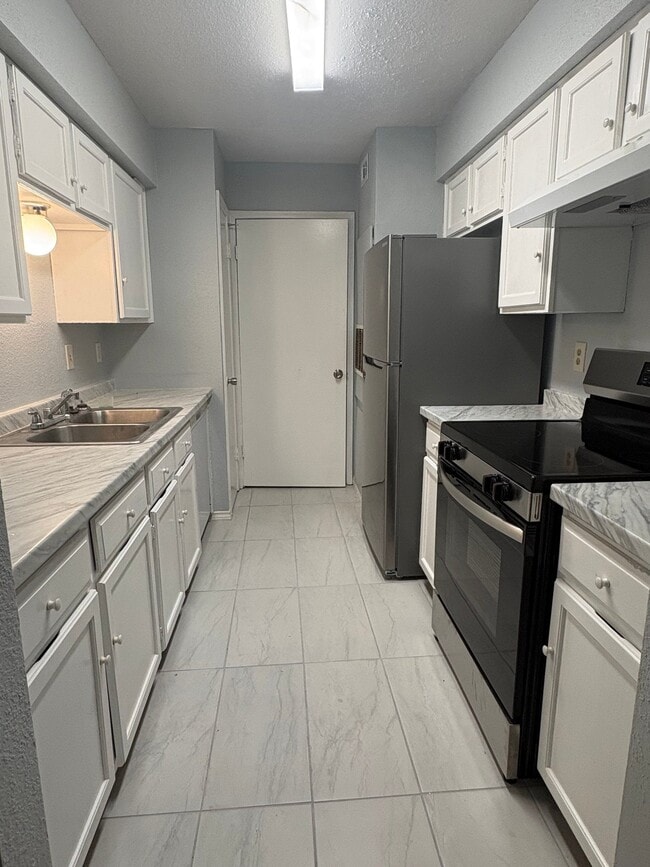 Photo - 9700 Leawood Blvd Unit 211