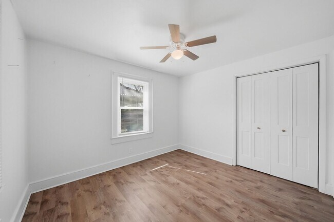 Photo - Charming 2BR Ranch with Spacious Yard & Ample Parking