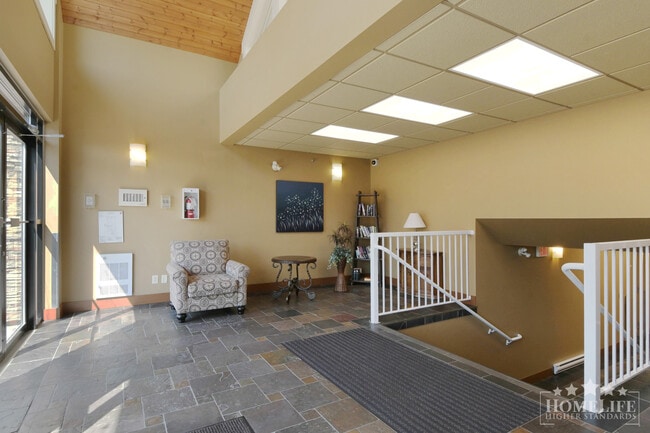 High-End Top-Floor 1 Bed + Den Condo with New Flooring & Paint in Central Chilliwack