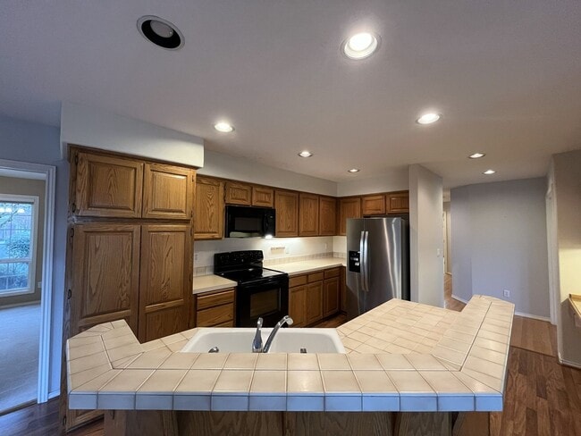 Photo - Elegant Home Offering Open Living Spaces, Spacious Primary Suite, and Nature-Inspired Yard