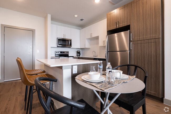 2 habitaciones, 2 baños - 995 pies cuadrados - Cocina/comedor - The Metropolitan 55+