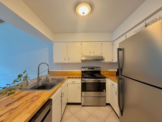 Photo - Charming Furnished 3BR Townhome with Modern Updates & Prime Location