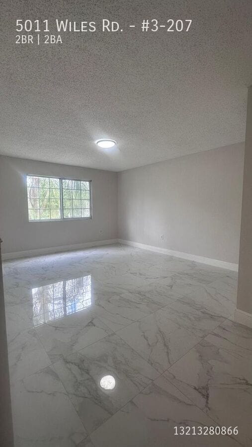 Building Photo - 5011 Wiles Rd Unit #3-207