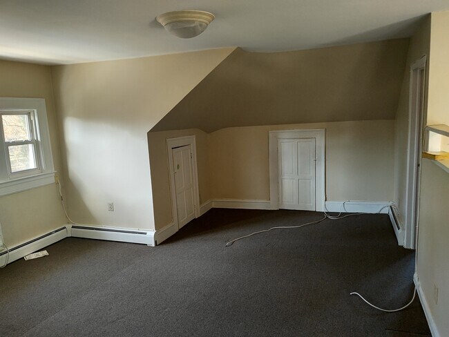 Living room with storage space - 1050 Stuyvesant Ave Unit 3
