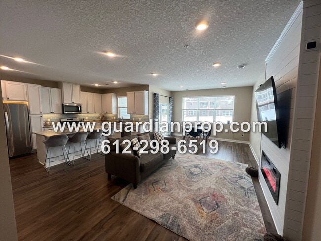 Building Photo - Luxury 2020 Built Townhouse Available June 1, Open Floor Plan, Fireplace, Patio, Primary w/Huge P...