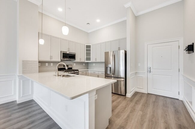 Building Photo - Modern 1BR Condo with Balcony & Luxury Amenities at Wellington Woods Unit A404