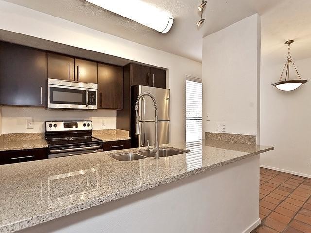 Building Photo - 5909 Birchbrook Dr Unit 103