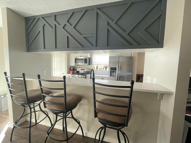 Área de comedor del bar - 7014 S Cannon Place Dr Unidad 7014 S Cannon Place