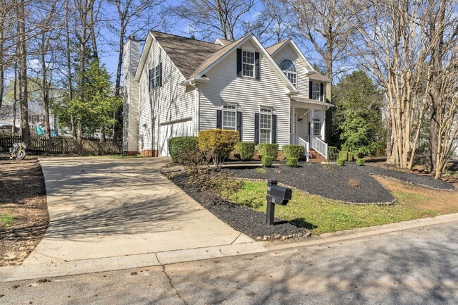 Photo - Beautifully Appointed 4BR Home Featuring a Screened Porch, Spacious Living Areas & Community Pool...