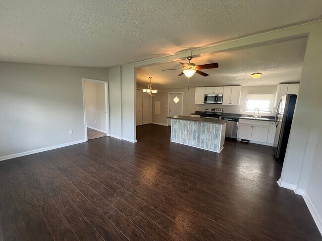 Photo - Introducing a charming 4-bedroom, 2-bathroom house in the desirable Gastonia, NC area