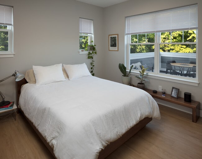 Bedroom with View to Private Deck (select units)